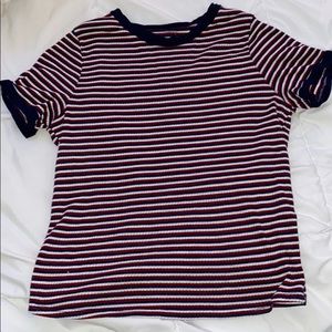 Red, white, and blue stripped ribbed shirt.